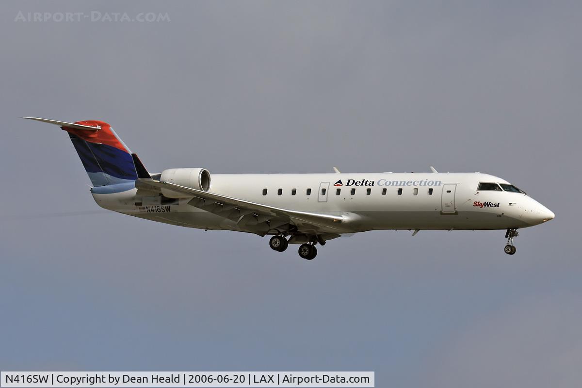N416SW, 1995 Canadair CRJ-200 (CL-600-2B19) C/N 7089, Delta Connection (Sky West Airlines) N416SW (FLT SKW61G) from Salt Lake City Int'l (KSLC) on final approach to RWY 24R.
