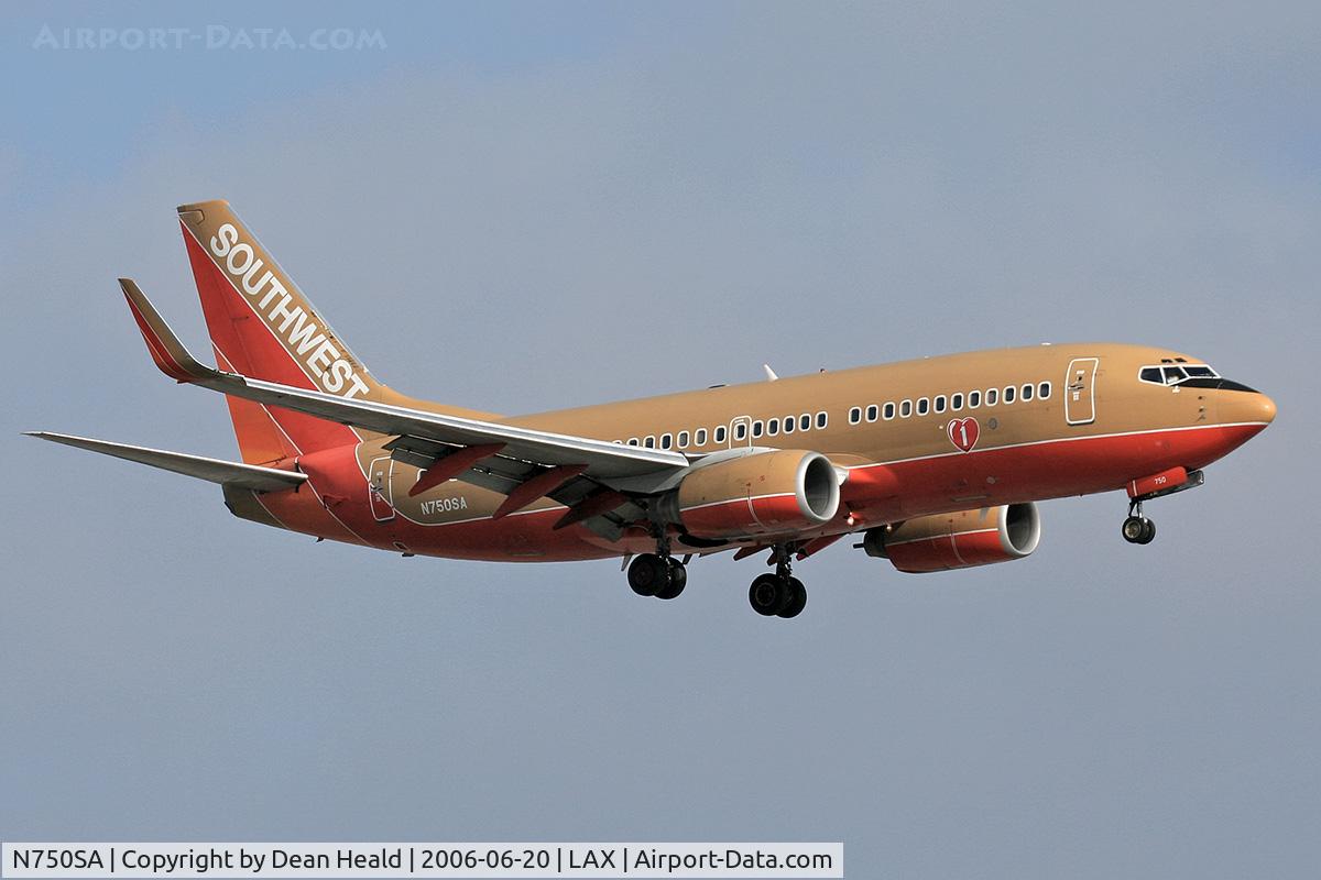 N750SA, 1999 Boeing 737-7H4 C/N 29802, Southwest Airlines N750SA (FLT SWA988) from Metropolitan Oakland Int'l (KOAK) on final approach to RWY 24R.