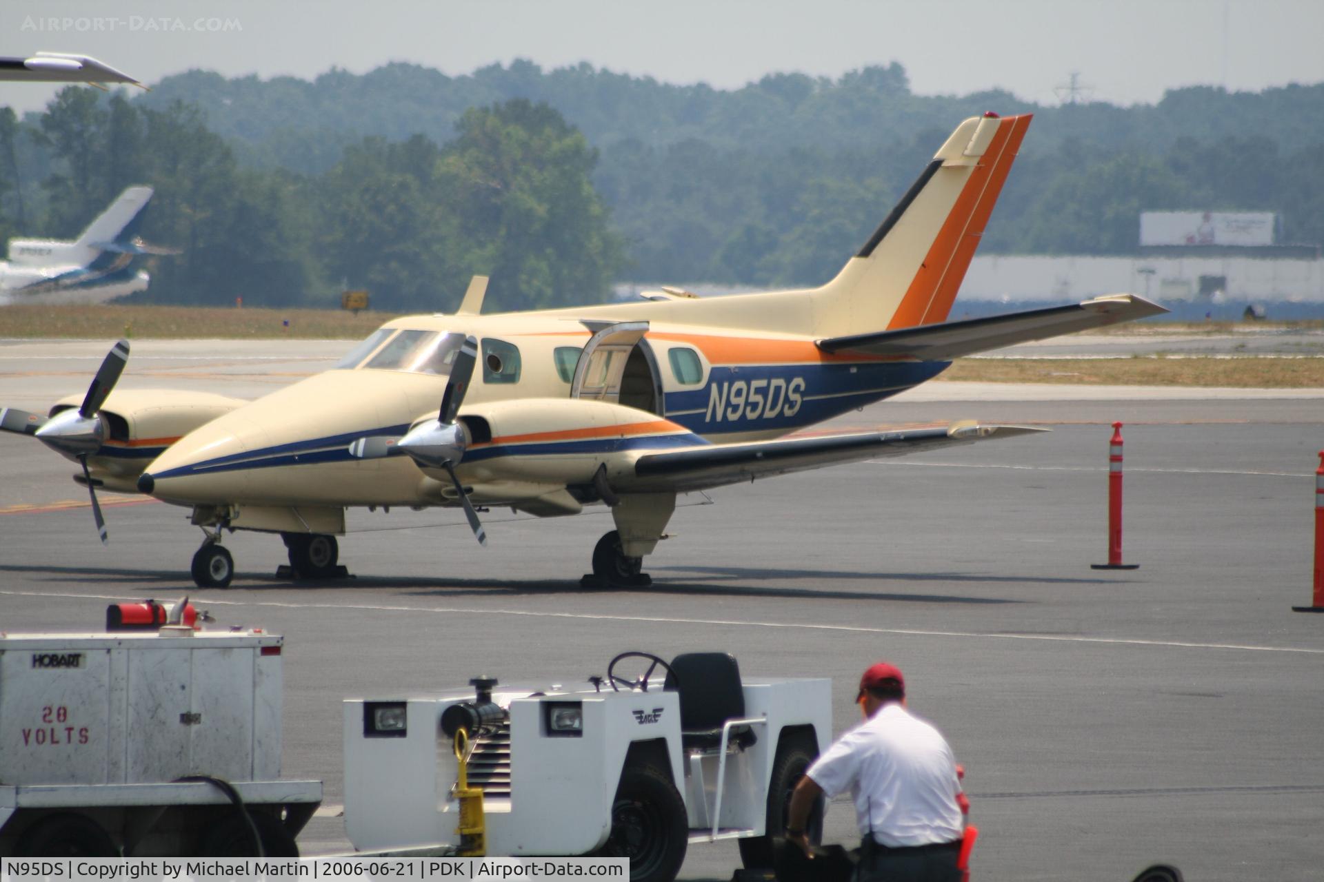 N95DS, 1975 Beech B-60 Duke C/N P-360, Tied down @ Mercury Air Center