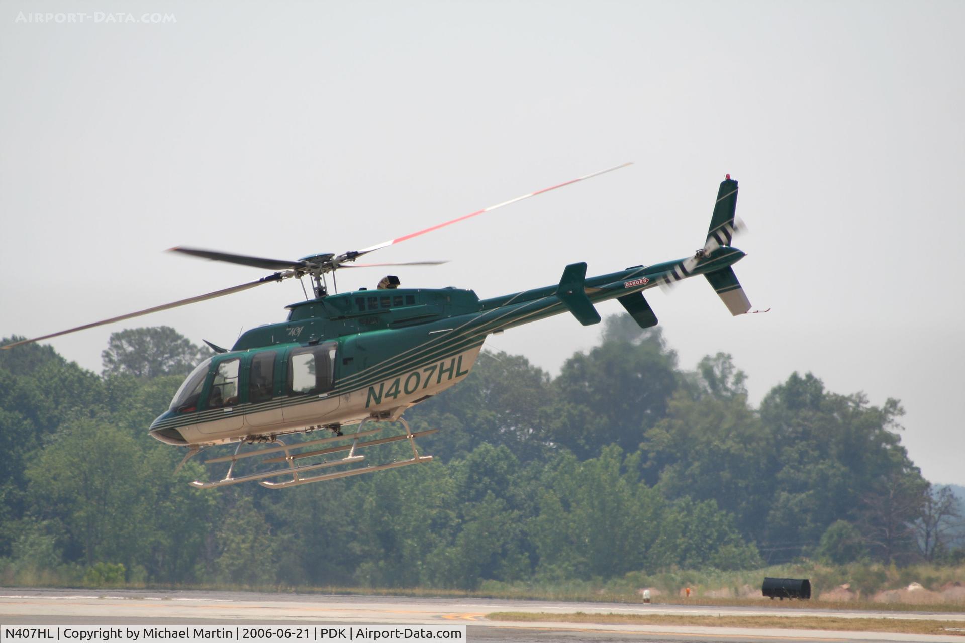N407HL, Bell 407 C/N 53869, Departing from Mercury Air Center