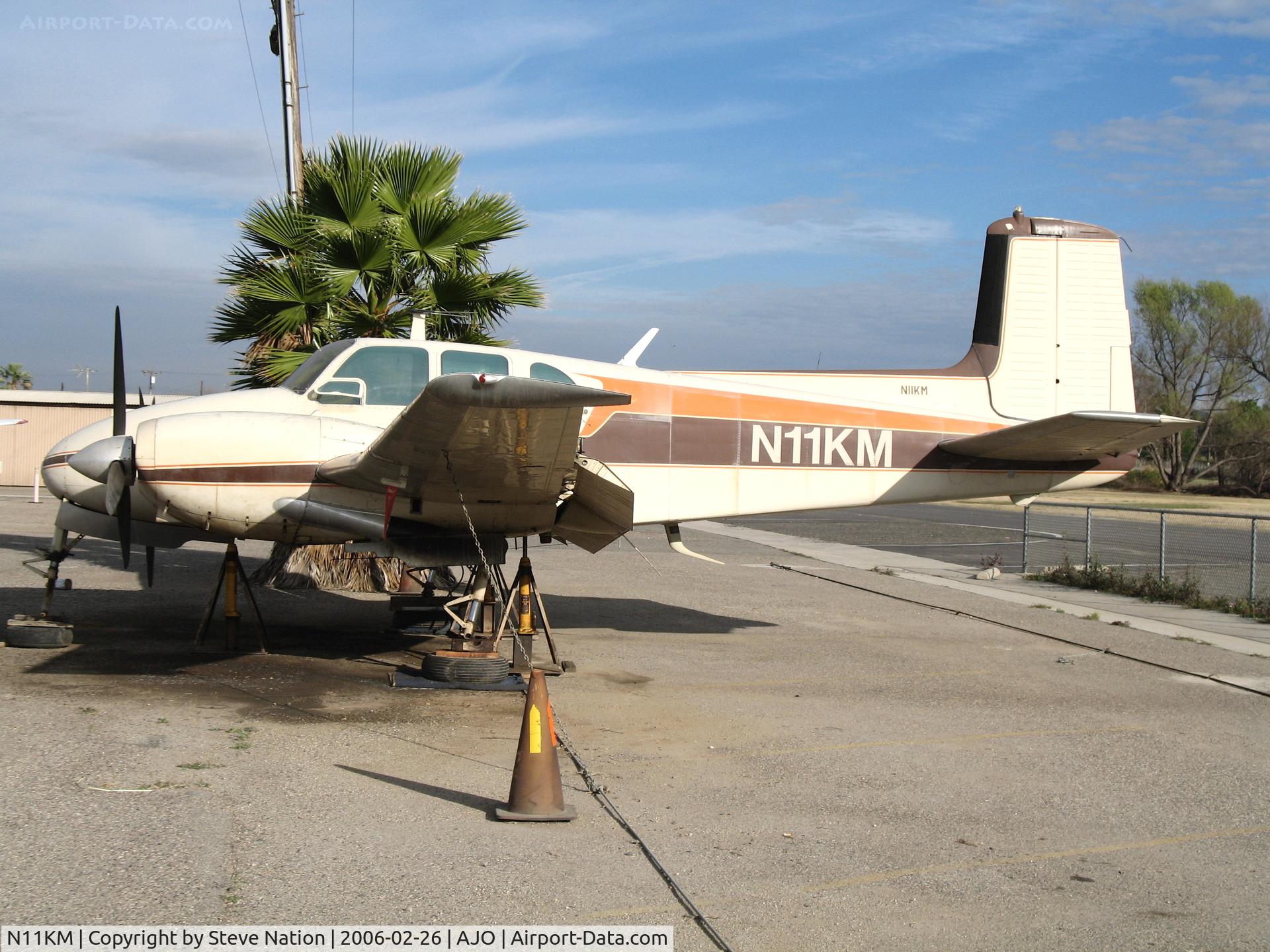 N11KM, 1960 Beech H50 C/N HH-127, 1960 Beech H50 on jacks @ Corona Municipal Airport, CA