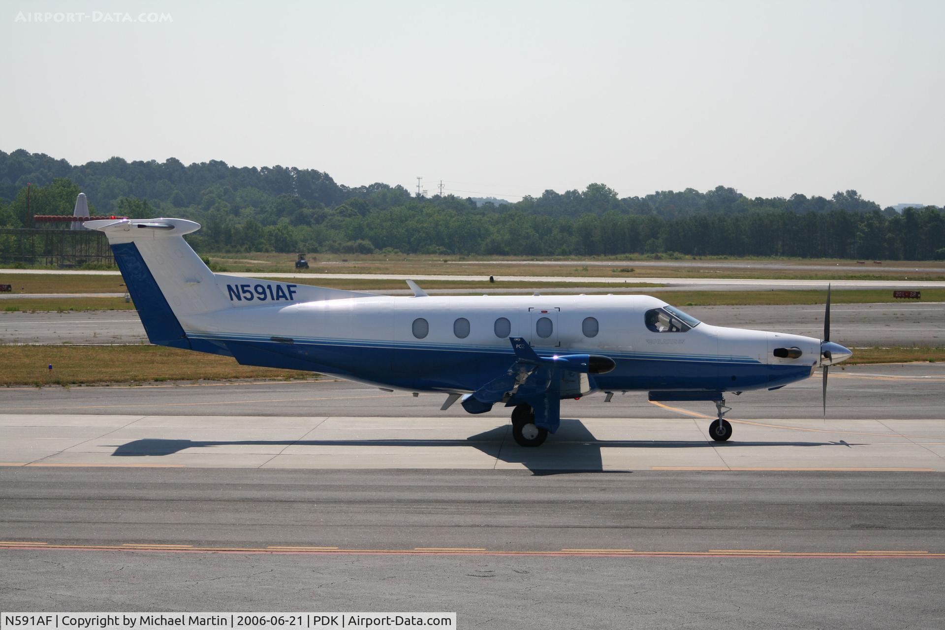 N591AF, 2004 Pilatus PC-12/45 C/N 591, Taxing to Runway 20R