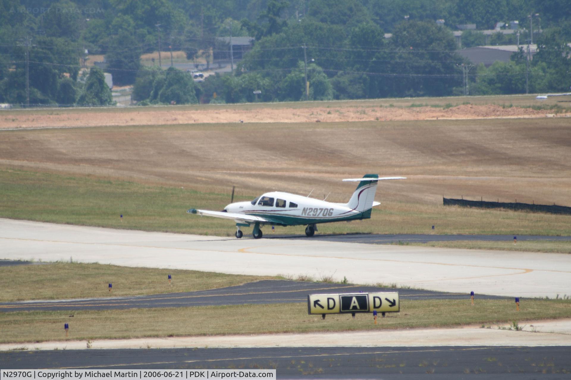 N2970G, 1979 Piper PA-28RT-201T Arrow IV C/N 28R-7931283, Taxing to Signature Air