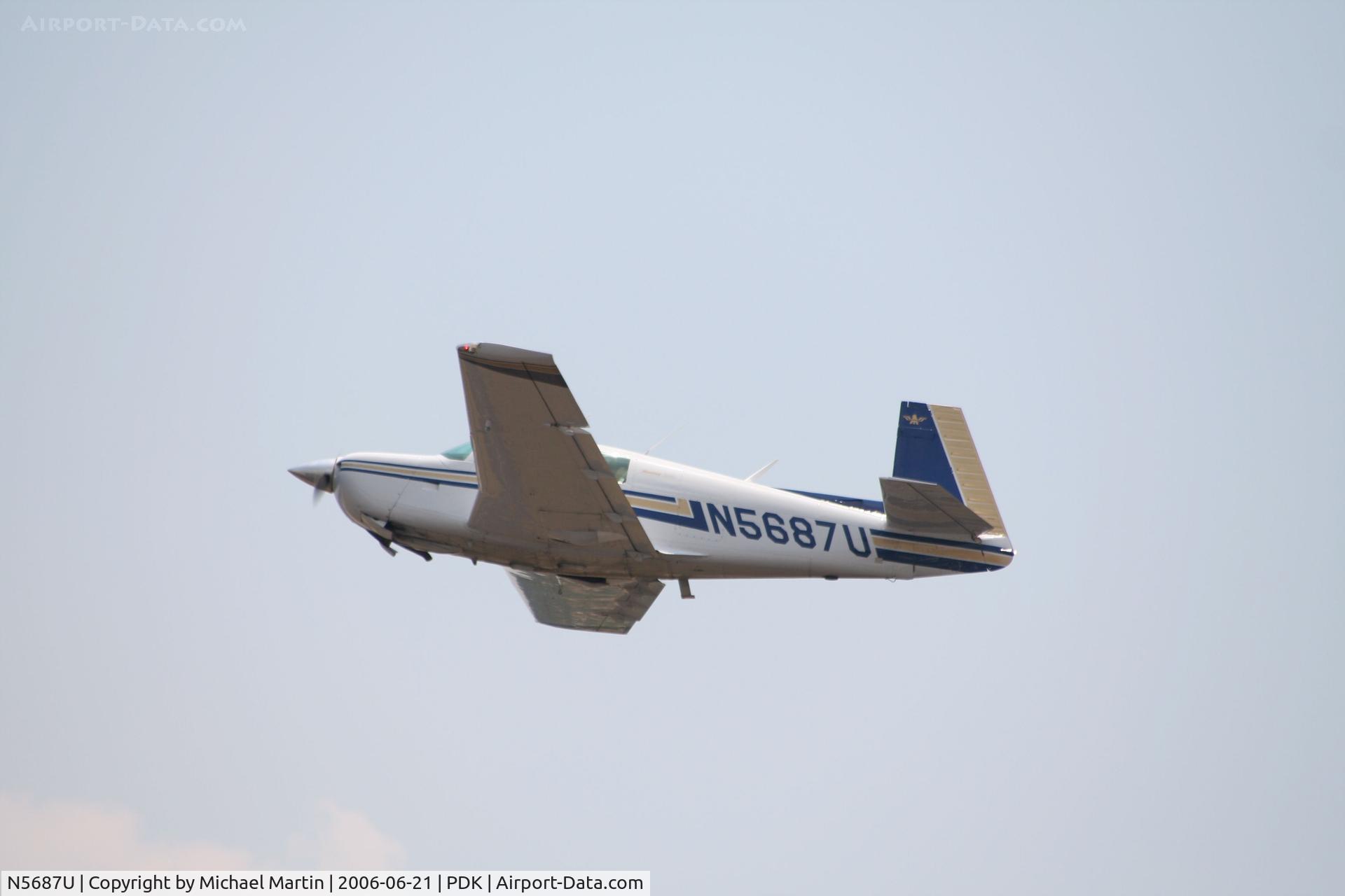 N5687U, 1983 Mooney M20J 201 C/N 24-1404, Over flying PDK