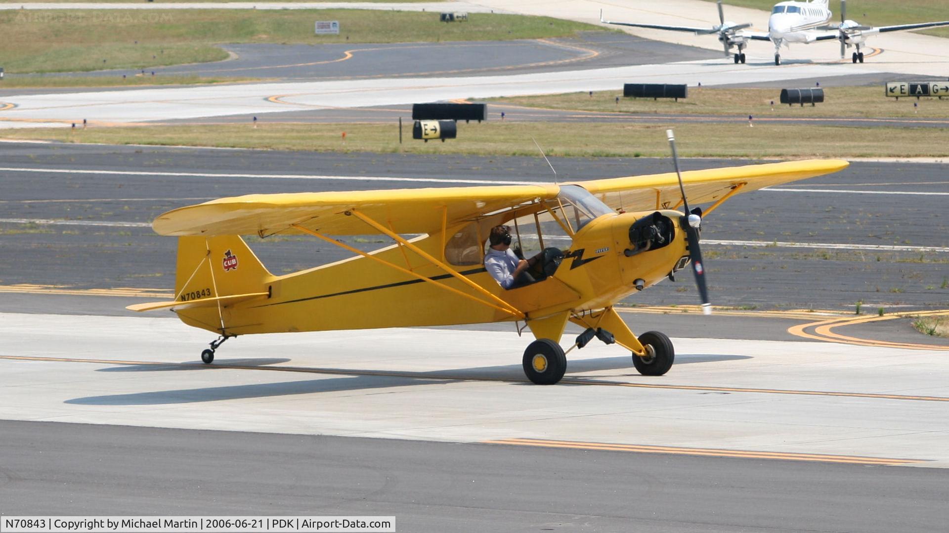N70843, 1946 Piper J3C-65 Cub C/N 17859, Keeping an eye out on the approaching King Air!