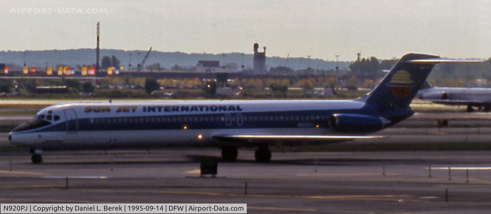N920PJ, 1975 Douglas DC-9-51 C/N 47677, This Sun Jet International DC-9-51 was originally delivered to Swissair in 1977; here she is coasting in at Dallas after a long flight from Newark one summer evening in 1995.