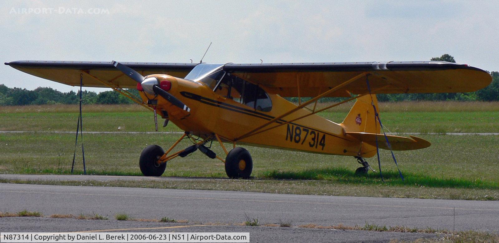 N87314, 1960 Piper PA-18A Super Cub C/N 18-7314, This Cub is well equipped for the rugged outdoors - just look at those tires!