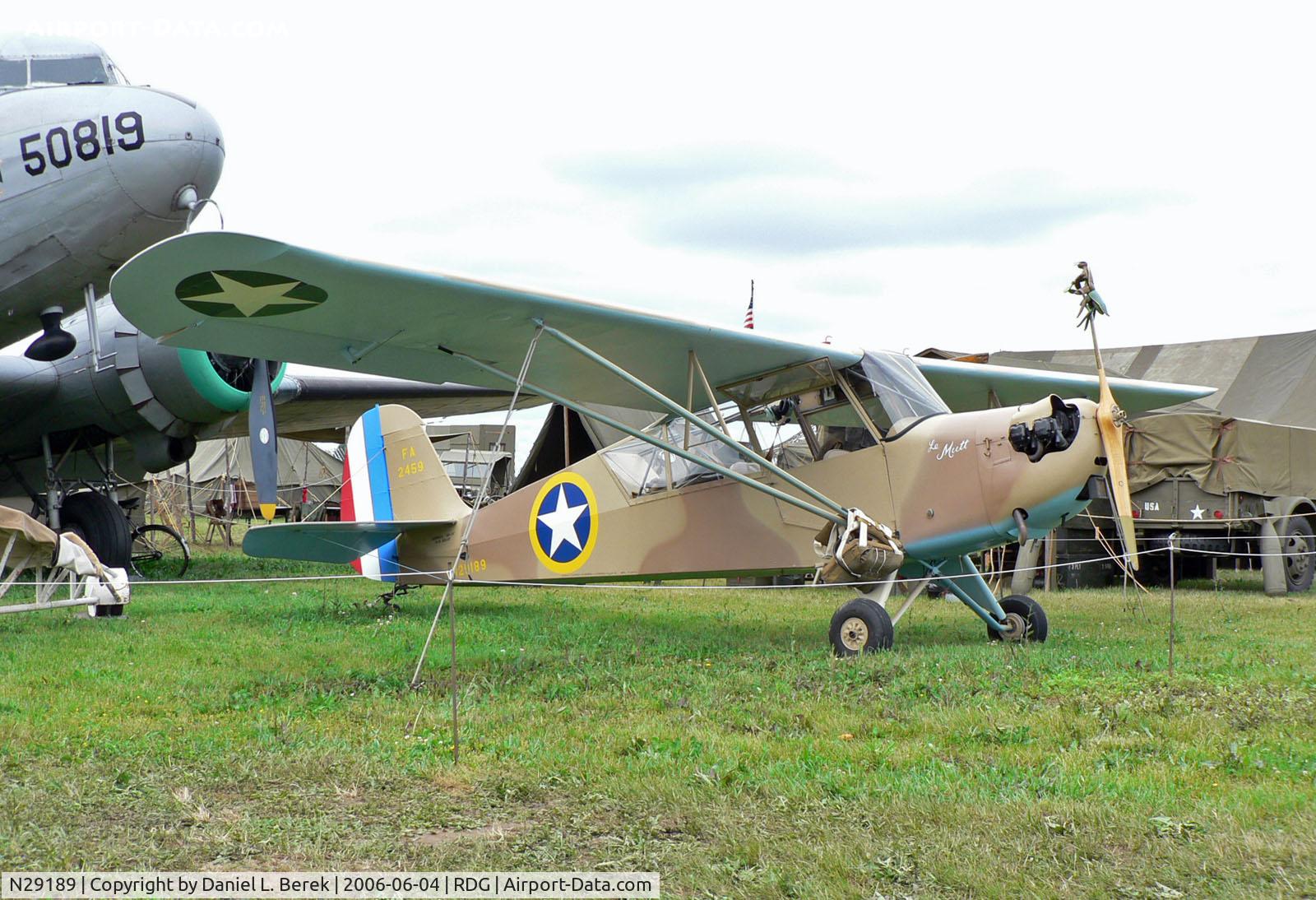 N29189, 1940 Aeronca 60-TF C/N 2510T, Cute little Aeronca snuggles under the nose of an R4D.