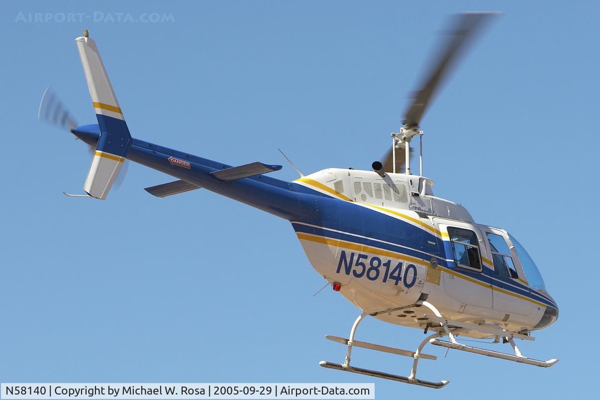 N58140, 1973 Bell 206B C/N 1108, Taking tourists for a 3 minute flight over Hoover dam.