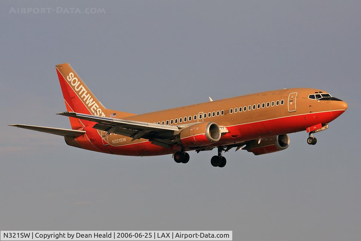N321SW, 1987 Boeing 737-3H4 C/N 23342, Southwest Airlines N321SW (FLT SWA420) from Salt Lake City Int'l (KSLC) on final approach to RWY 24R.