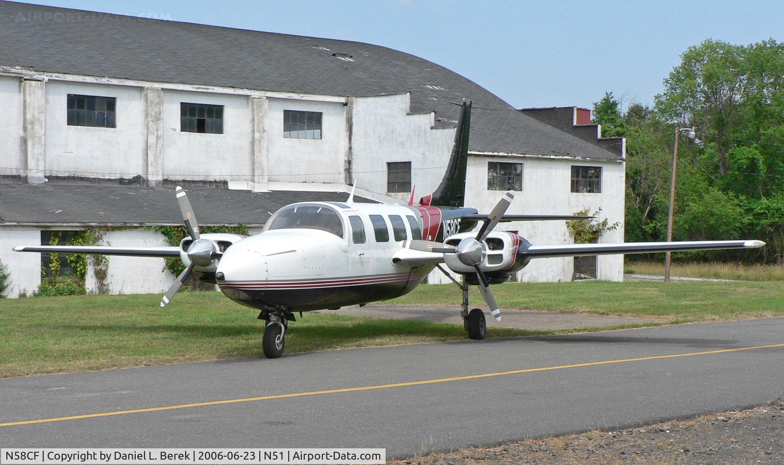 N58CF, 1977 Smith Aerostar 601P C/N 61P-0459-179, This gorgeous aircraft tried hiding from me, but I found her hiding behind some shrubbery at Solberg Airport.