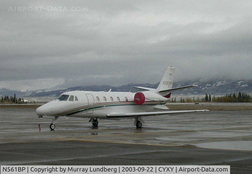 N561BP, 2000 Cessna 560XL C/N 560-5134, At Whitehorse on September 22, 2003. There's a sign beside the door that says 