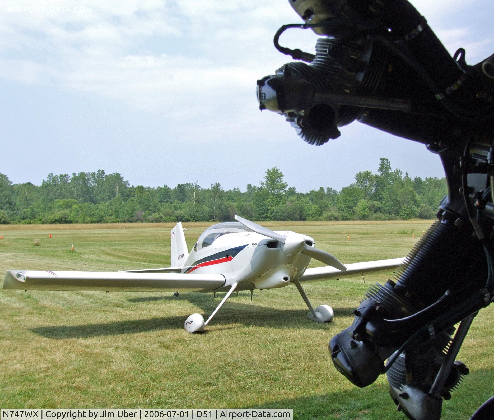 N747WX, Vans RV-6 C/N 20477, RV-6 framed by old Kinner Engine