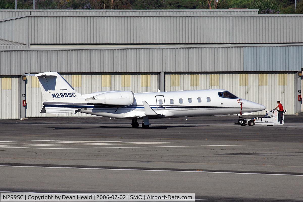 N299SC, 1997 Learjet Inc 60 C/N 112, 1997 Learjet 60 N299SC being towed to the business jet terminal at Santa Monical Municipal Airport (KSMO) - Santa Monica, California.