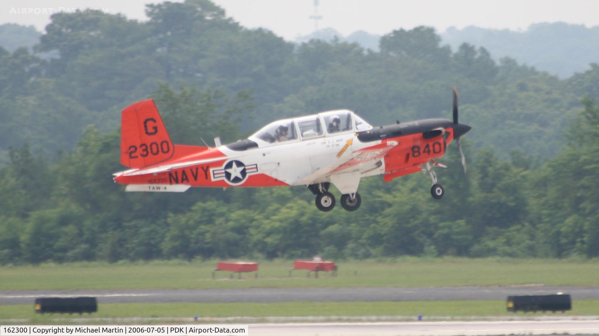 162300, Beech T-34C Turbo Mentor C/N GL-298, Departing 20L - Gear Up!