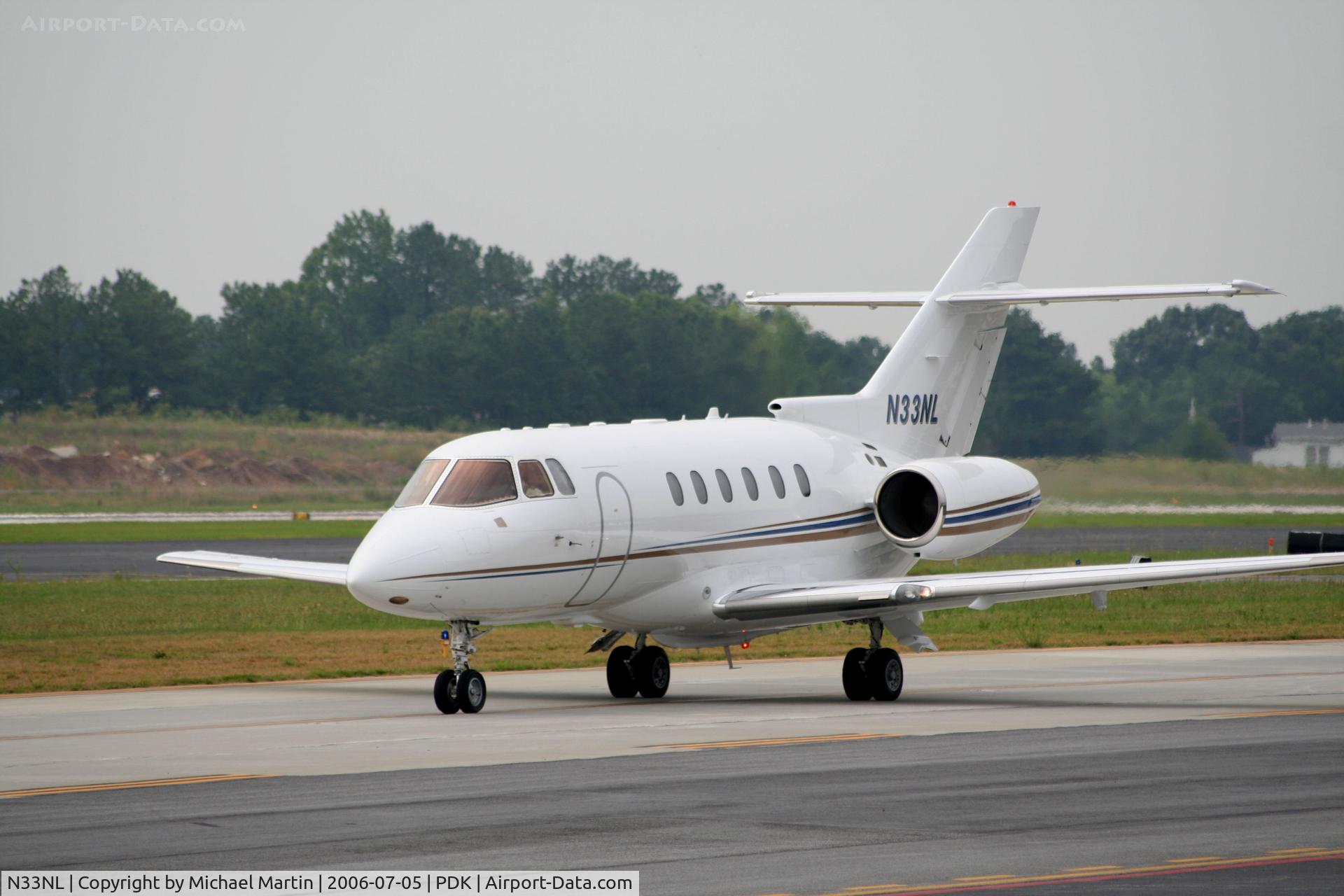 N33NL, 2003 Raytheon Hawker 800XP C/N 258643, Taxing from Mercury Air Service