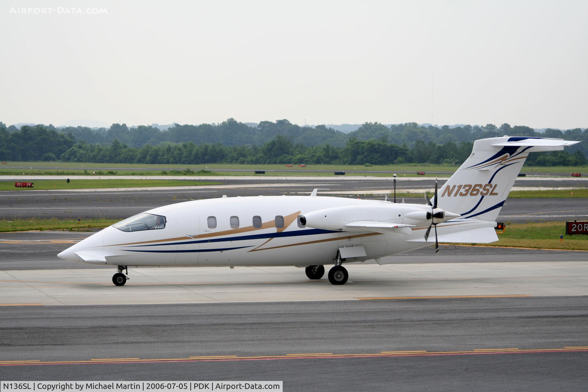 N136SL, 2005 Piaggio P-180 C/N 1101, Taxing to Epps Air Service