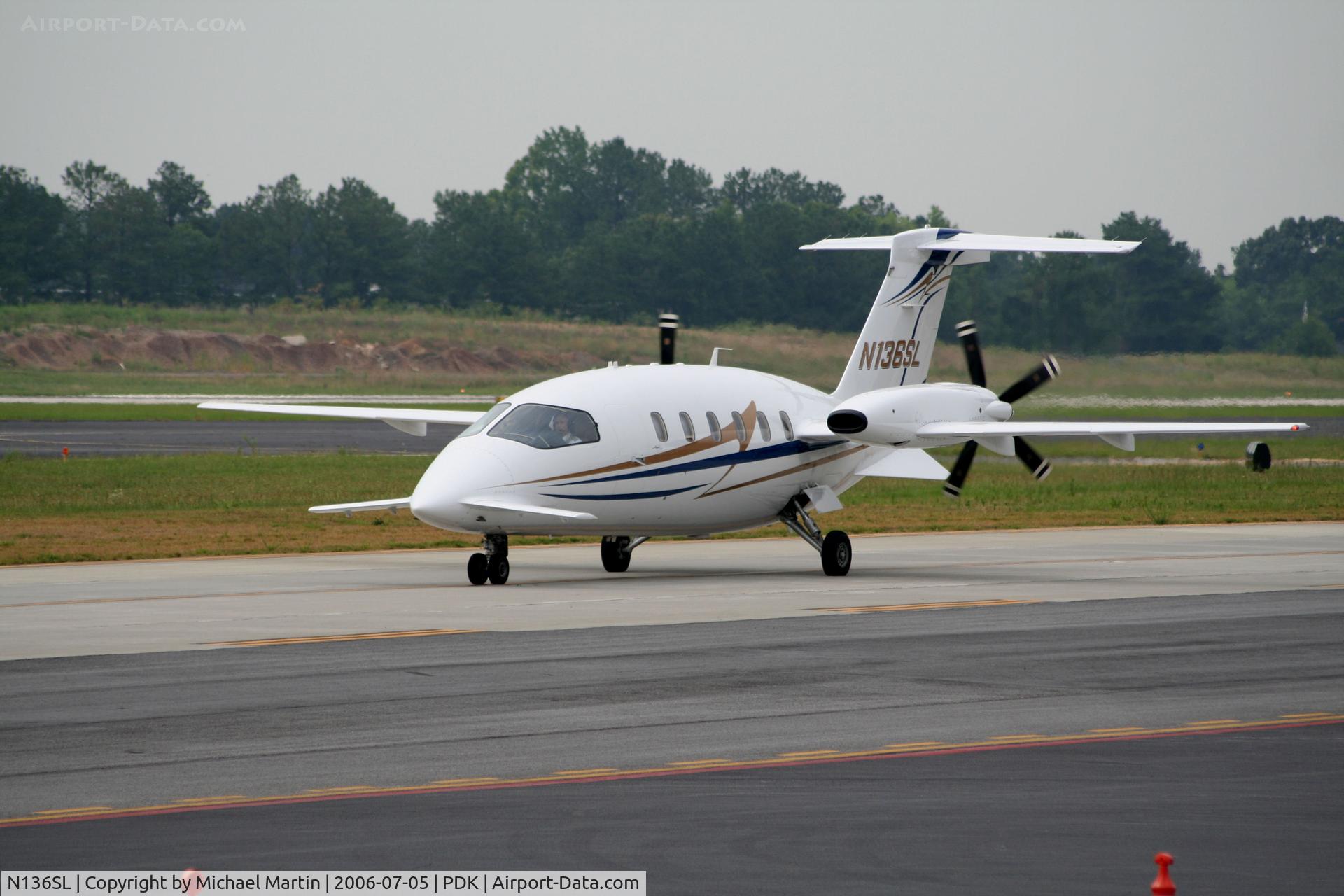 N136SL, 2005 Piaggio P-180 C/N 1101, Taxing to Epps Air Service