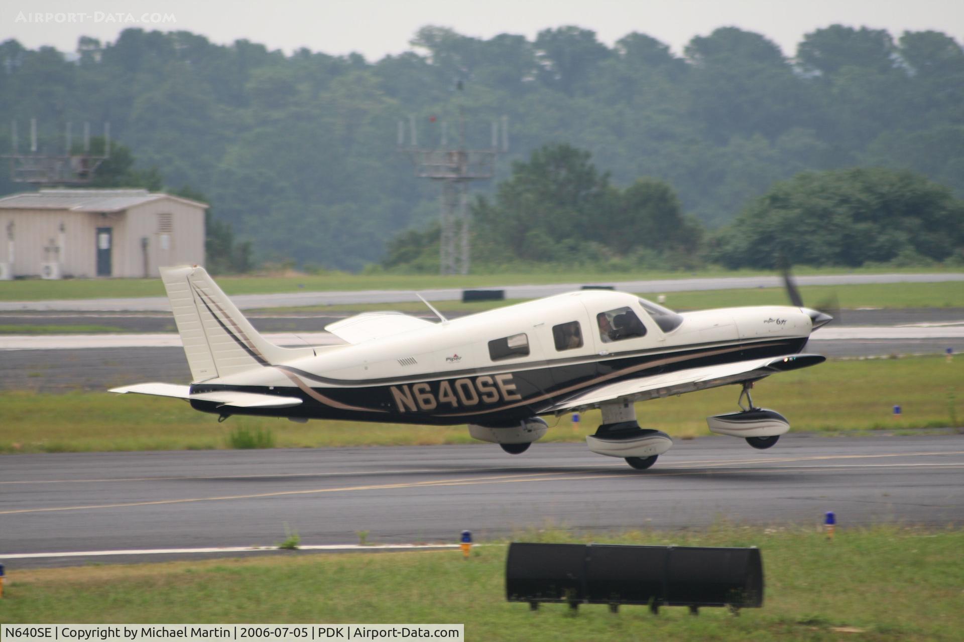 N640SE, 2005 Piper PA-32-301XTC Saratoga C/N 3255040, Departing 20R