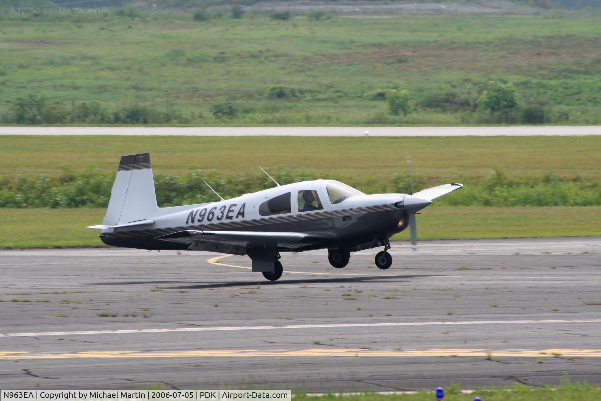 N963EA, 1962 Mooney M20C Ranger C/N 2256, Landing Runway 20R