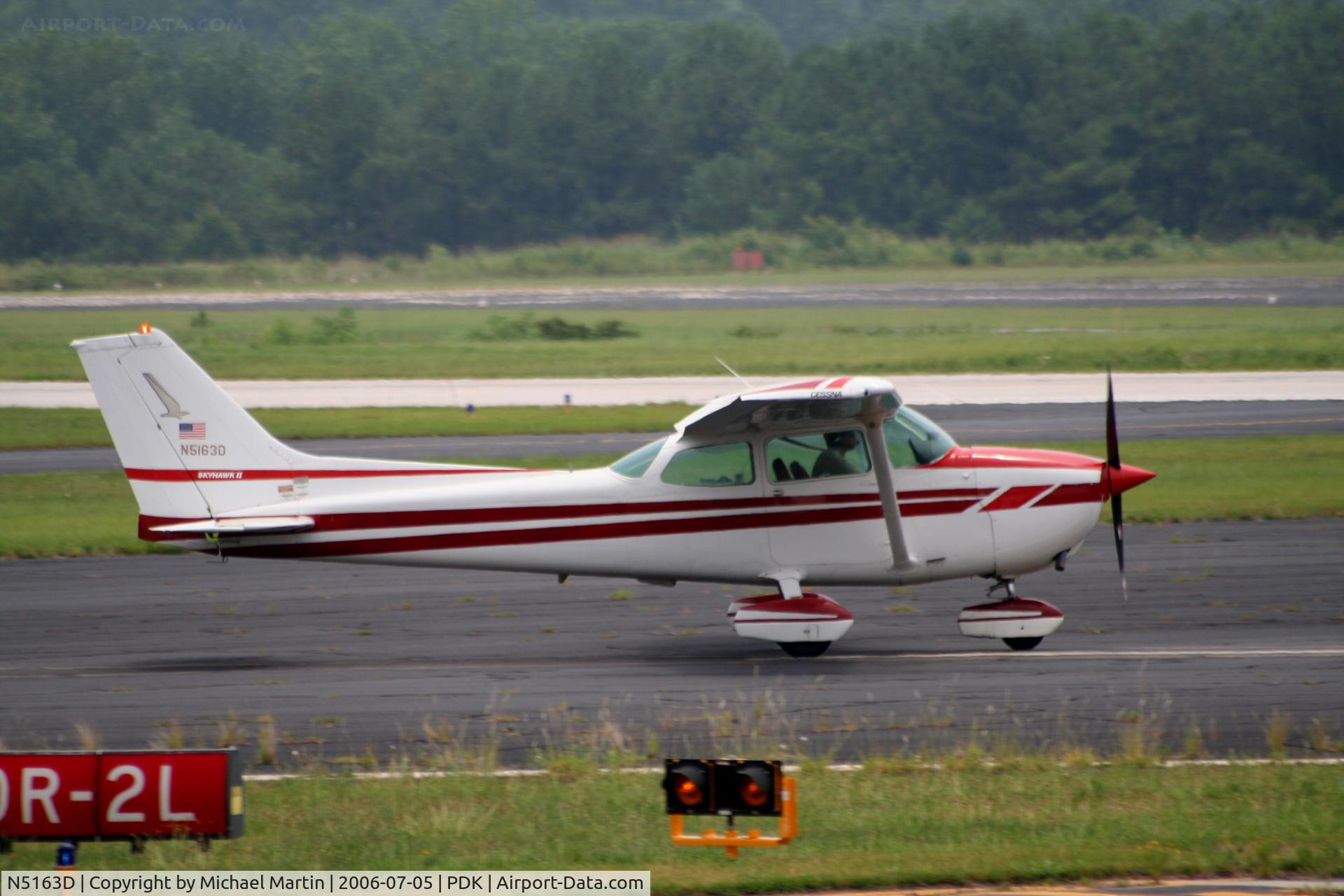 N5163D, 1979 Cessna 172N C/N 17272438, Departing Runway 20R