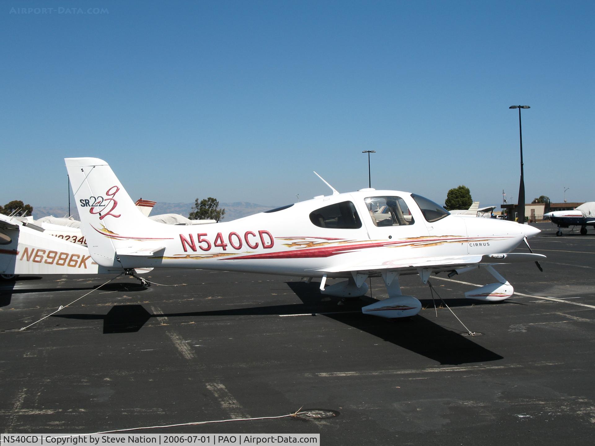 N540CD, 2005 Cirrus SR22 C/N 1625, Perennial Aviation 2005 Cirrus Design SR22 in flaming colors on sunny Saturday afternoon @ Palo Alto Municipal Airport, CA