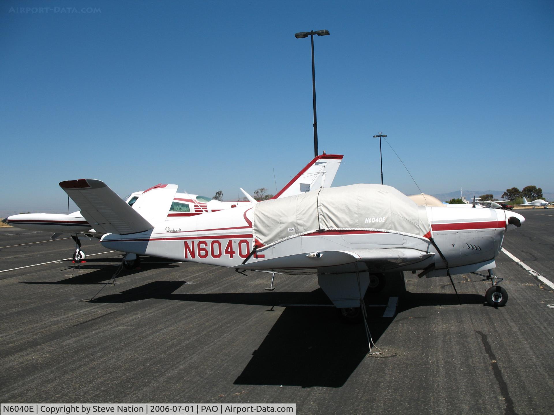 N6040E, 1959 Beech K35 Bonanza C/N D-6007, 1959 Beech K35 Bonanza with cockpit cover on sunny Saturday afternoon @ Palo Alto Municipal Airport, CA