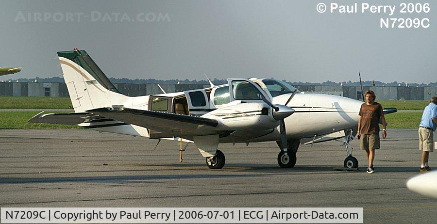 N7209C, 1984 Beech 58 Baron C/N TH-1424, Prepping for departure, still loading with the aft doors open.