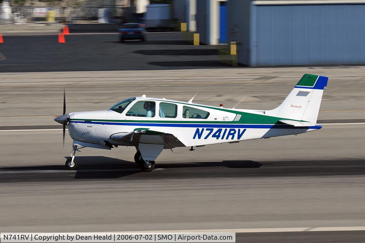 N741RV, 1987 Beech F33A Bonanza C/N CE-1198, 1987 Beech F33A N741RV during takeoff roll on RWY 21 at Santa Monica Municipal Airport (KSMO) - Santa Monica, California.