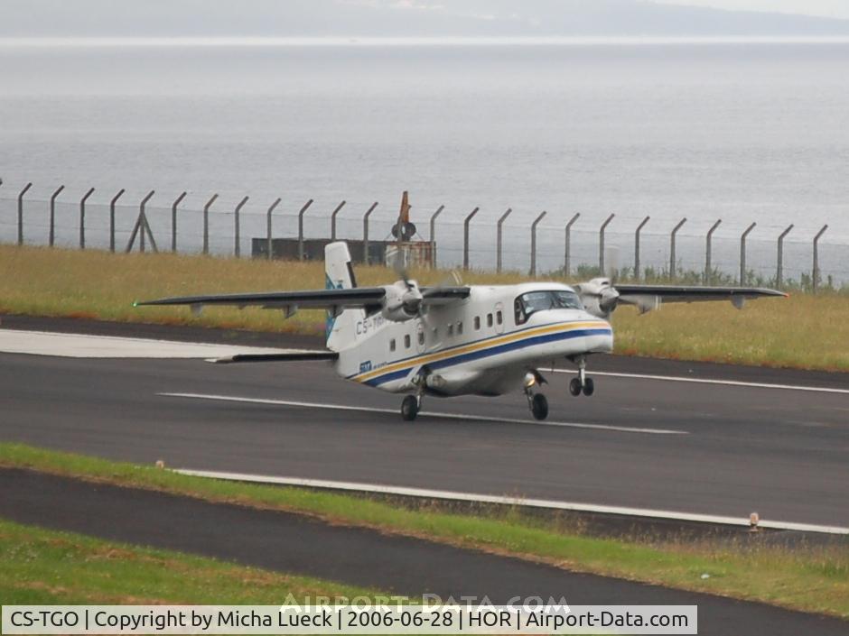 CS-TGO, 1987 Dornier 228-201 C/N 8119, Touching down at Horta/Azores. Landing gear looks funny - as if it will break off any moment...