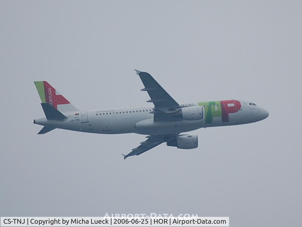 CS-TNJ, 2000 Airbus A320-214 C/N 1181, Cloudy and grey in the morning. The same aircraft returned in the afternoon, and it was sunny (see my other pics)
