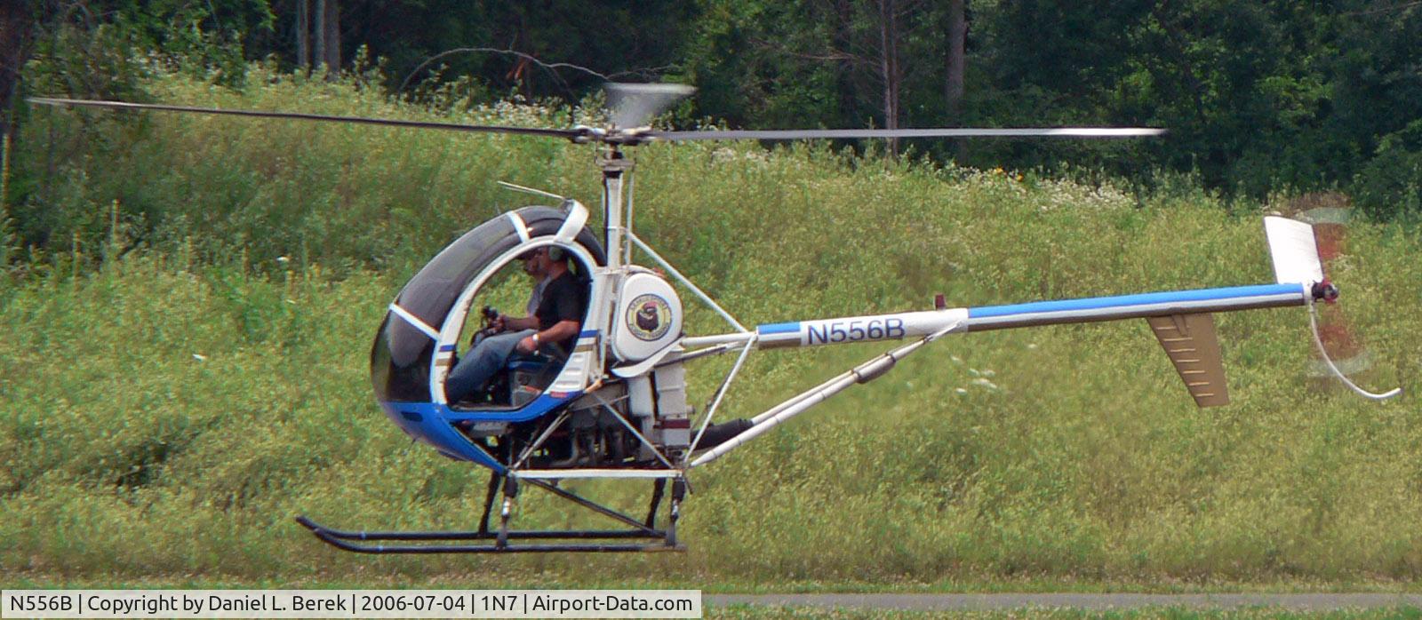N556B, 1986 Hughes 269C C/N S1235, This Hughes helicopter was making practice maneuvers at its home base.