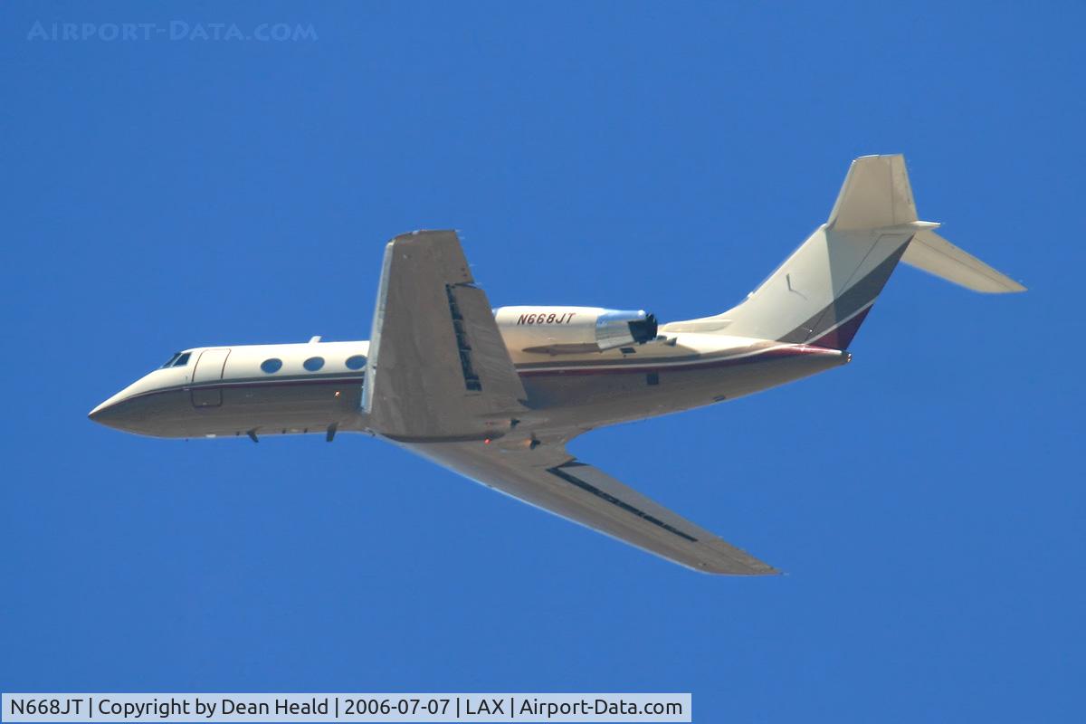 N668JT, 1975 Grumman G-1159 Gulfstream II C/N 162, FlightWorks Gulfstream G-2 N668JT (FLT FWK668) climbing out from RWY 25L.