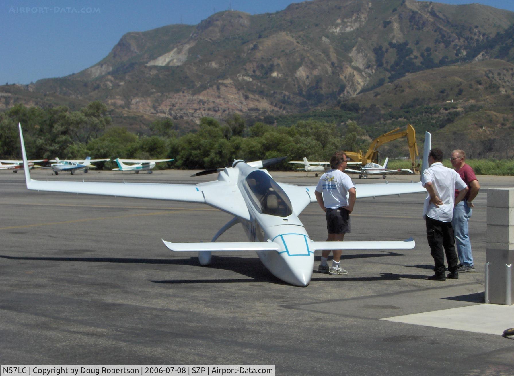 N57LG, 1983 Rutan VariEze C/N 57Z, 1983 Godsey/Klaus Savier modified Rutan VARI-EZE, Continental O-200 100+ Hp, this World record speedster always attracts attention, Klaus owner/modifier of Light Speed Engineering, Inc. in shorts, refueling