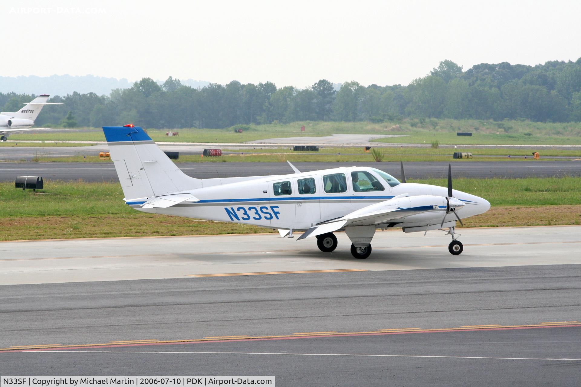 N33SF, 1972 Beech 58 Baron C/N TH-190, Taxing to Mercury Air Center