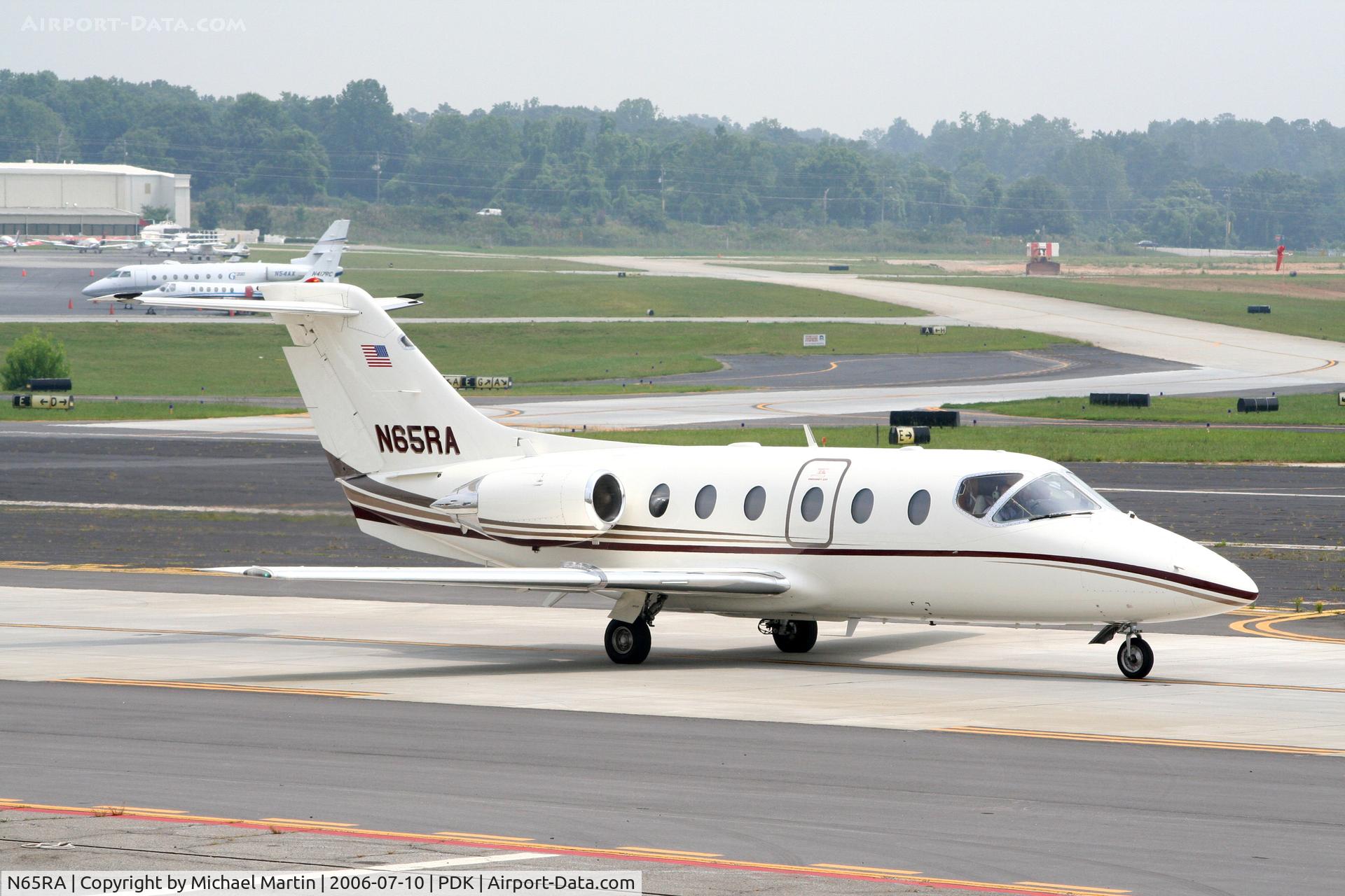 N65RA, Beech 400 Beechjet C/N RJ-9, Taxing past Mercury Air Service