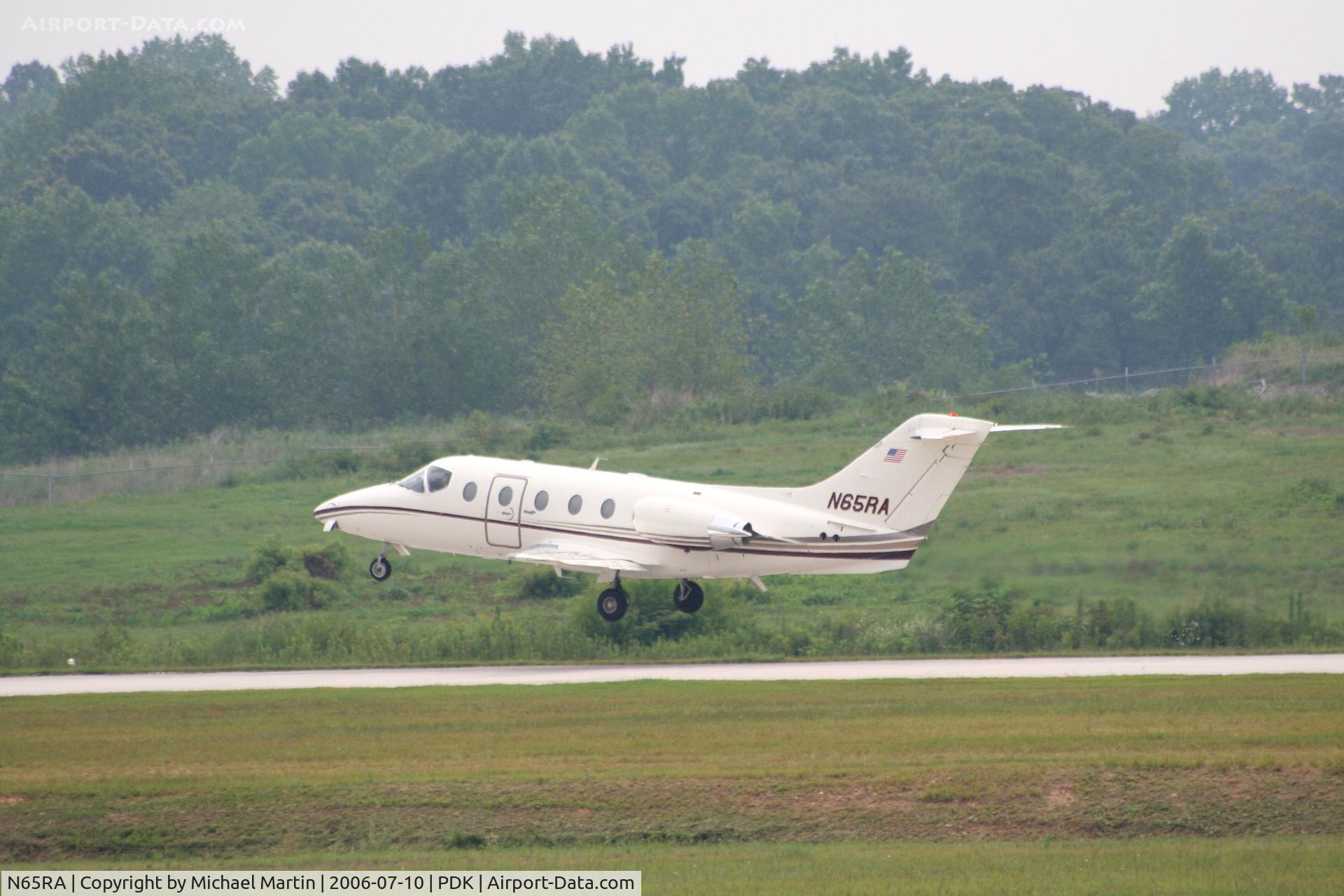 N65RA, Beech 400 Beechjet C/N RJ-9, Departing 2L