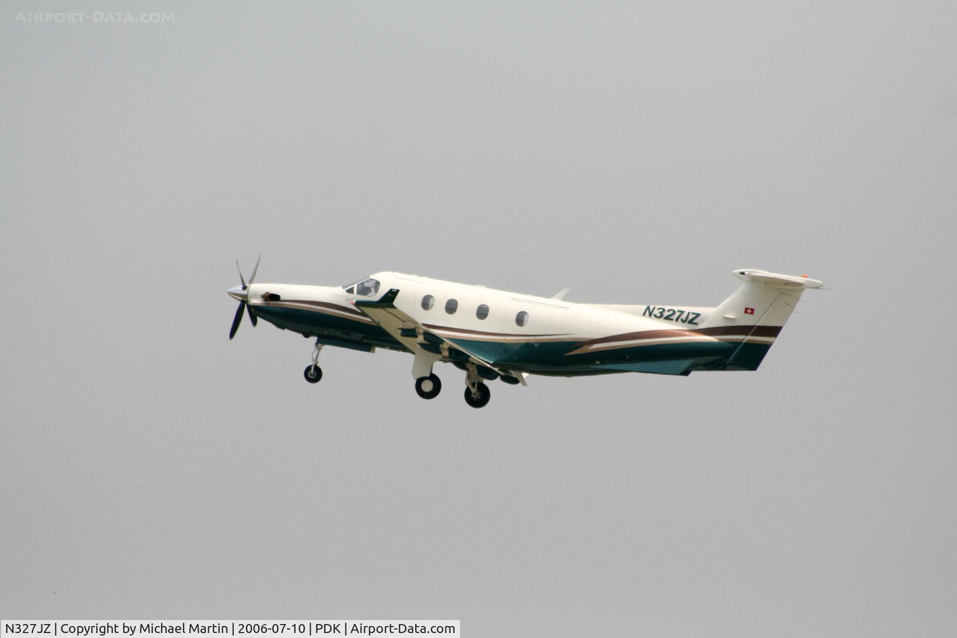 N327JZ, 2000 Pilatus PC-12/45 C/N 327, In flight after leaving PDK