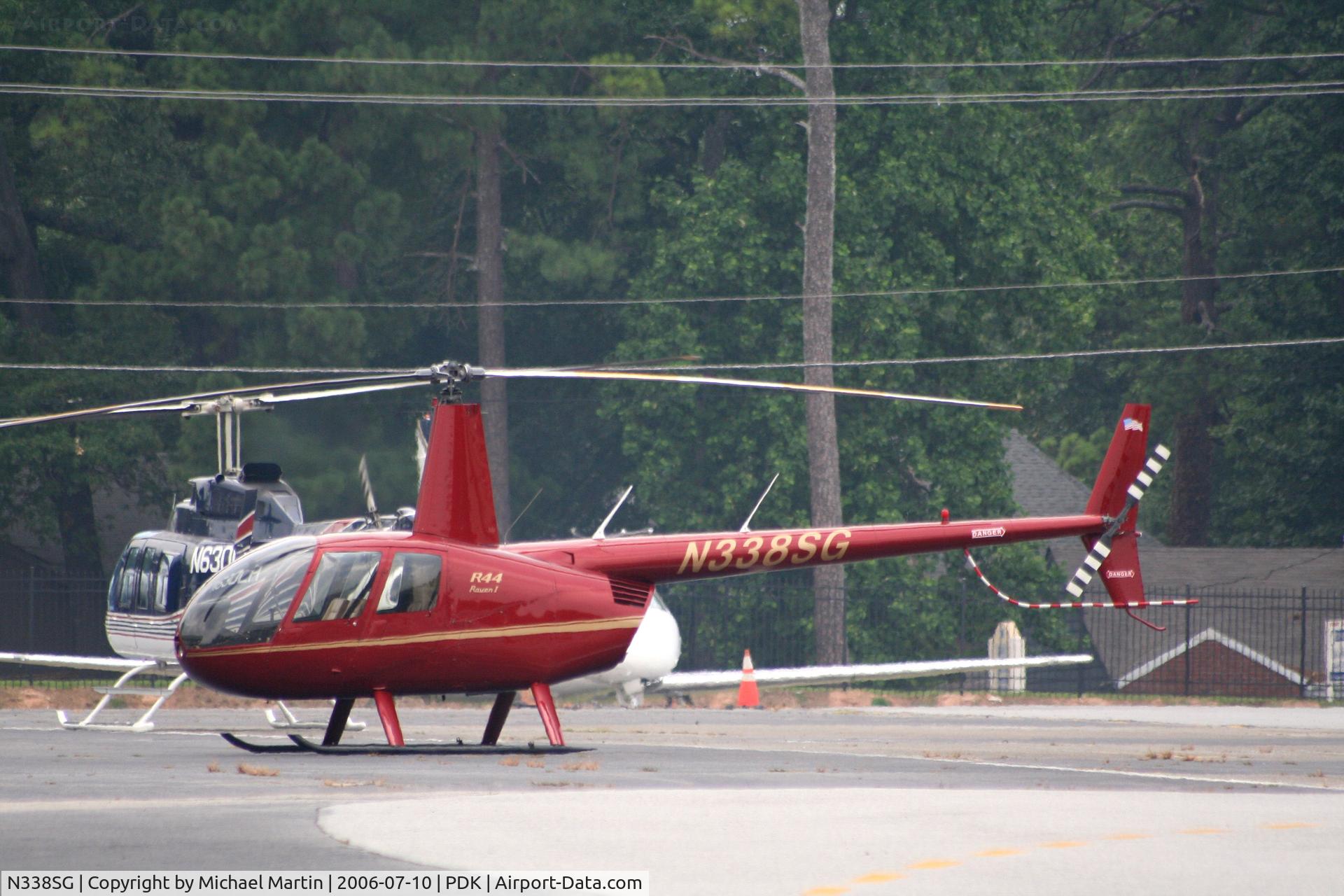 N338SG, 2003 Robinson R44 C/N 1338, Parked behind Epps Air Service