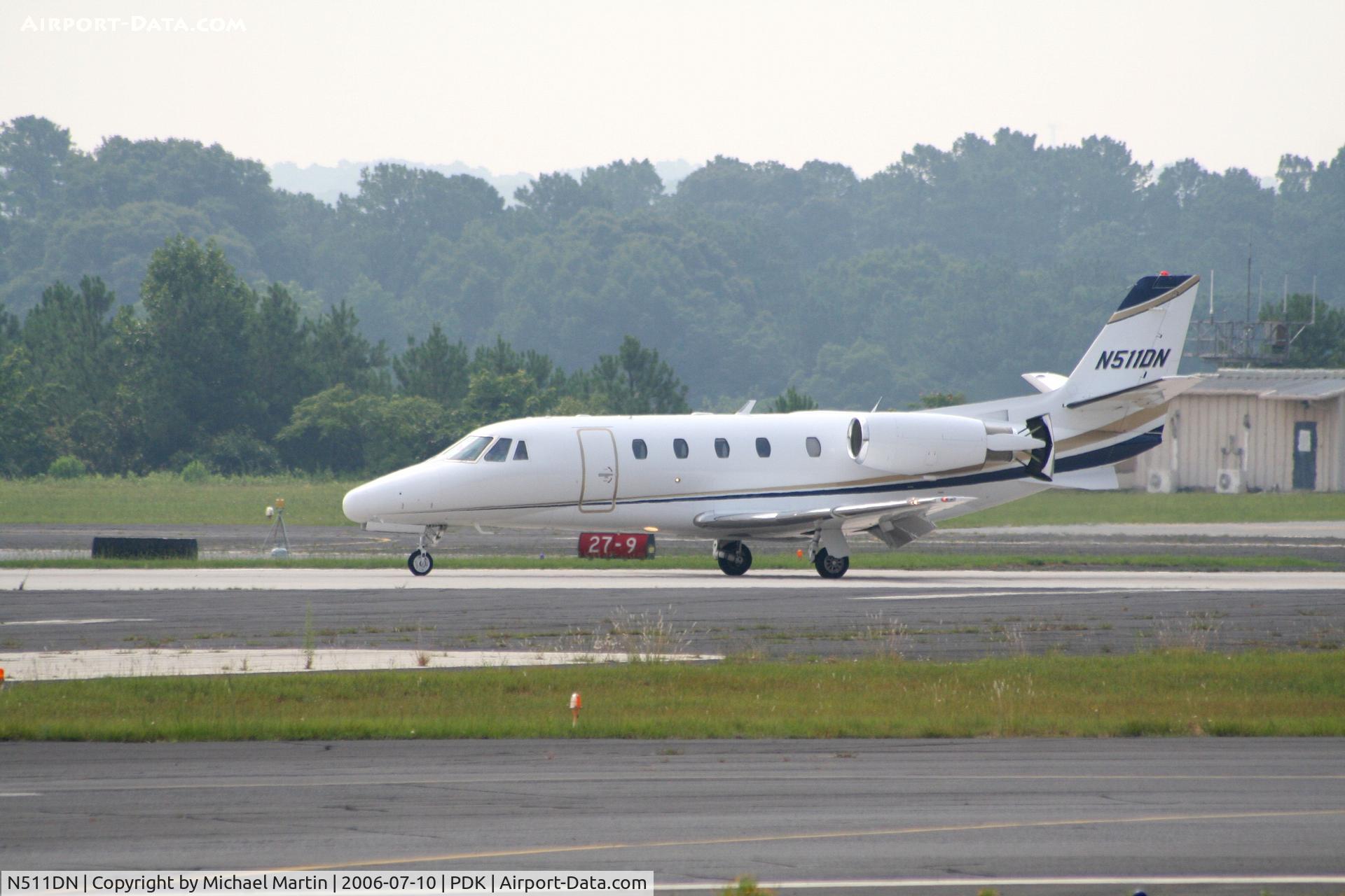 N511DN, 2002 Cessna 560XL Citation Excel C/N 560-5231, Landing 2R with airbrakes extended