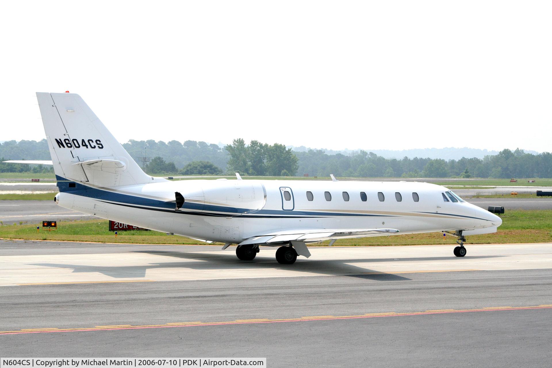 N604CS, 2004 Cessna 680 Citation Sovereign C/N 680-0007, Taxing past Mercury Air Service