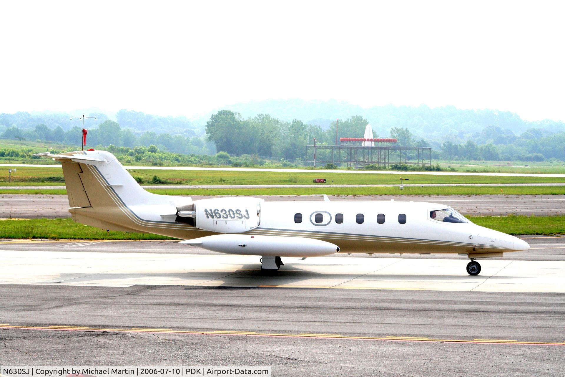 N630SJ, 1980 Gates Learjet 35A C/N 344, Taxing past Mercury Air Service