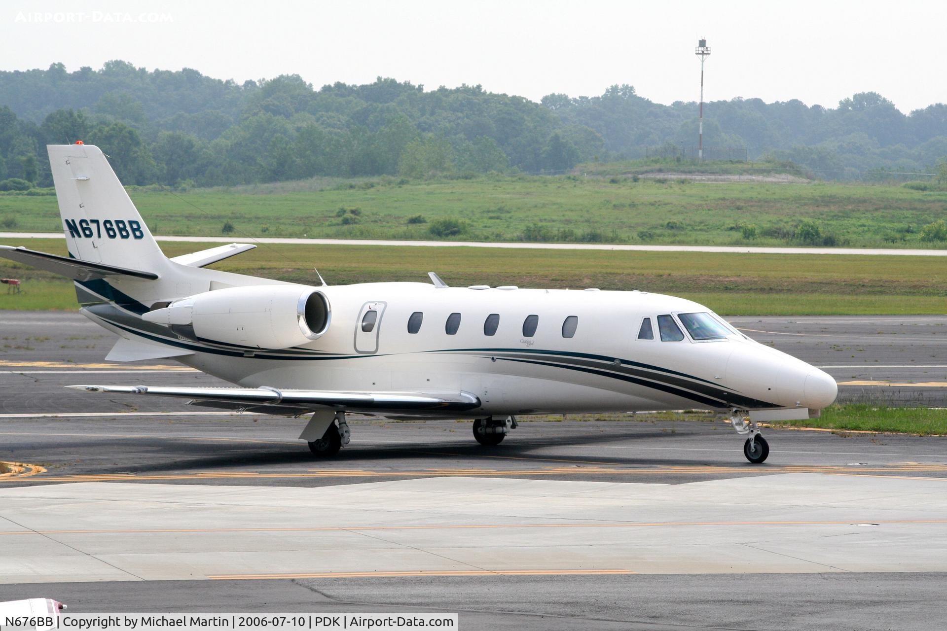 N676BB, 2003 Cessna 560XL C/N 5605349, Taxing past Mercury Air Service