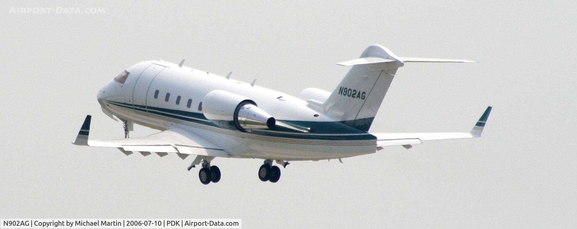 N902AG, 2001 Bombardier Challenger 604 (CL-600-2B16) C/N 5512, Departing 2R - Gear Up!