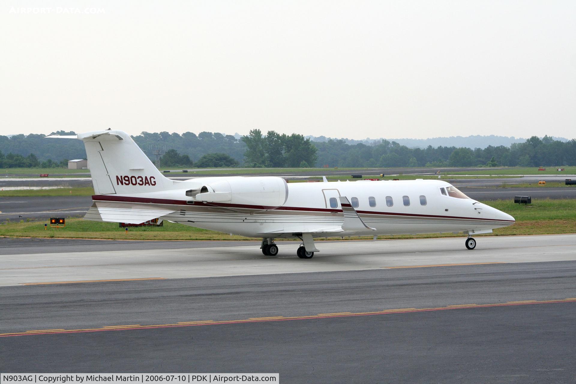 N903AG, 1994 Learjet 60 C/N 60-045, Taxing past Mercury Air Service