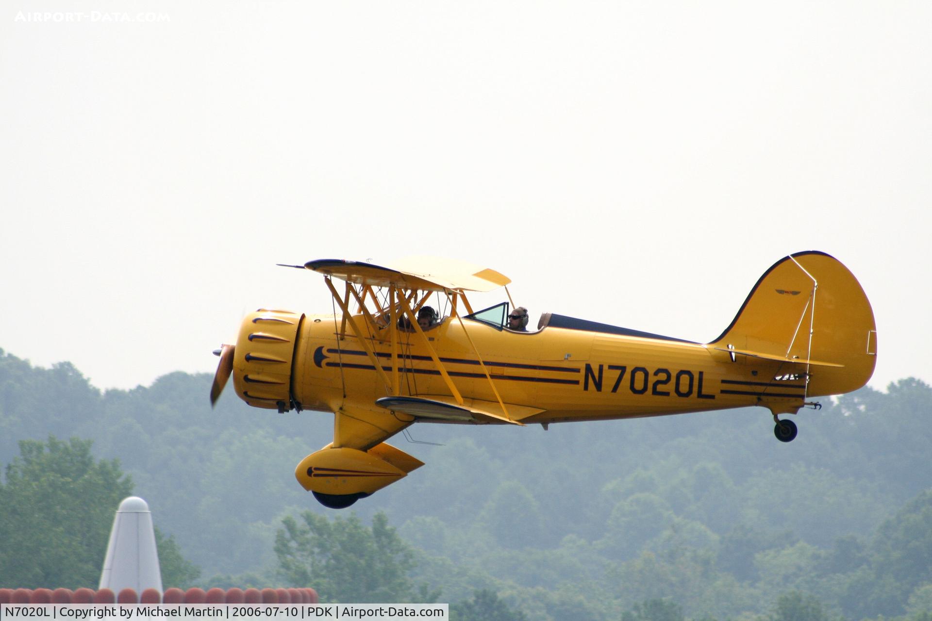 N7020L, 1999 Waco YMF-F5C C/N F5C085, Over flying PDK