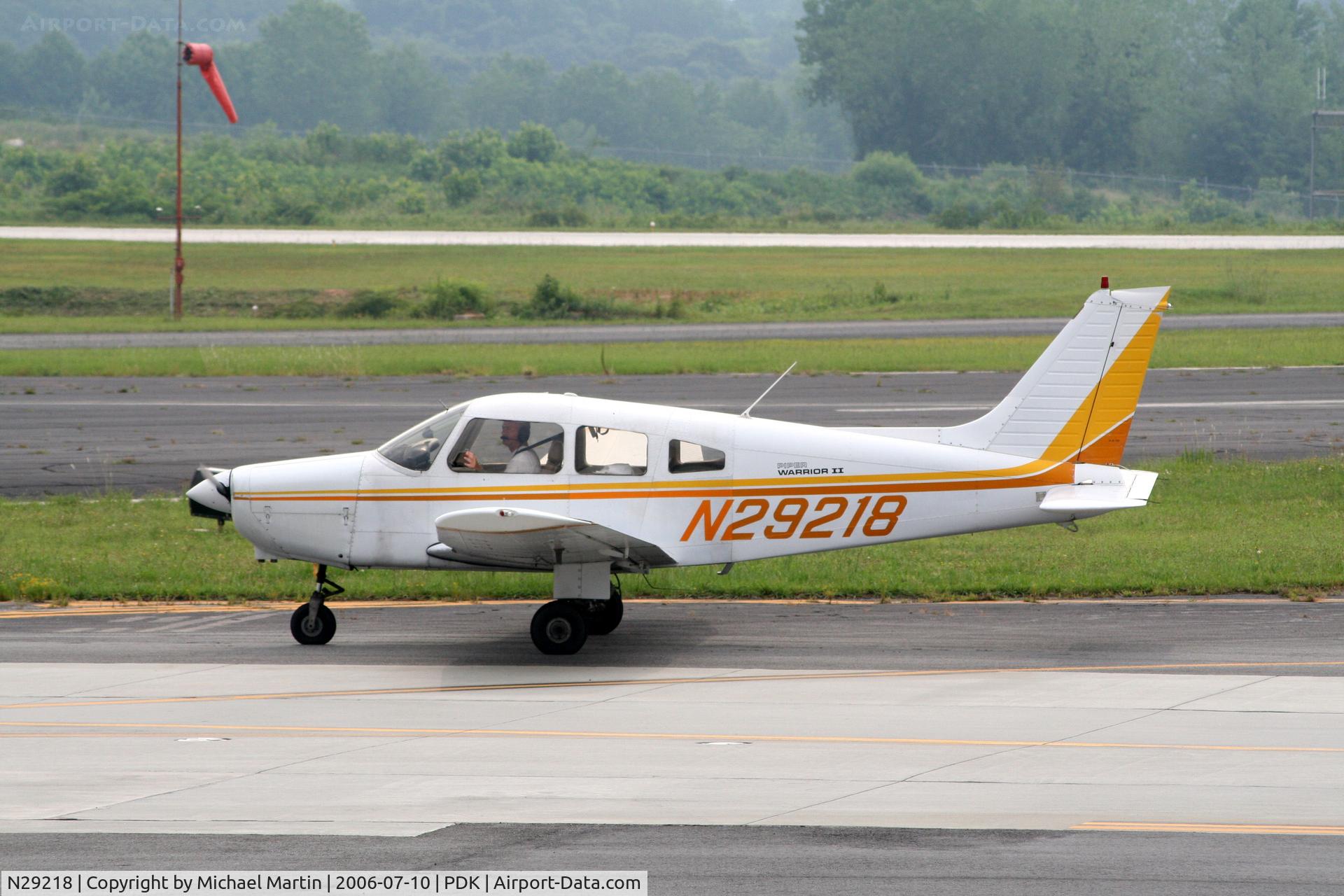 N29218, 1979 Piper PA-28-161 C/N 28-7916422, Taxing past Mercury Air Service