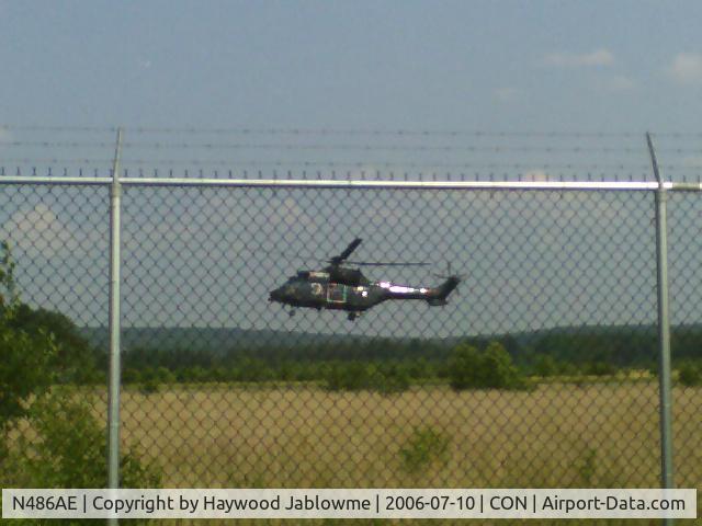 N486AE, 2003 Eurocopter AS-332L-1 Super Puma C/N 9003, Low and quick on the closed ramp