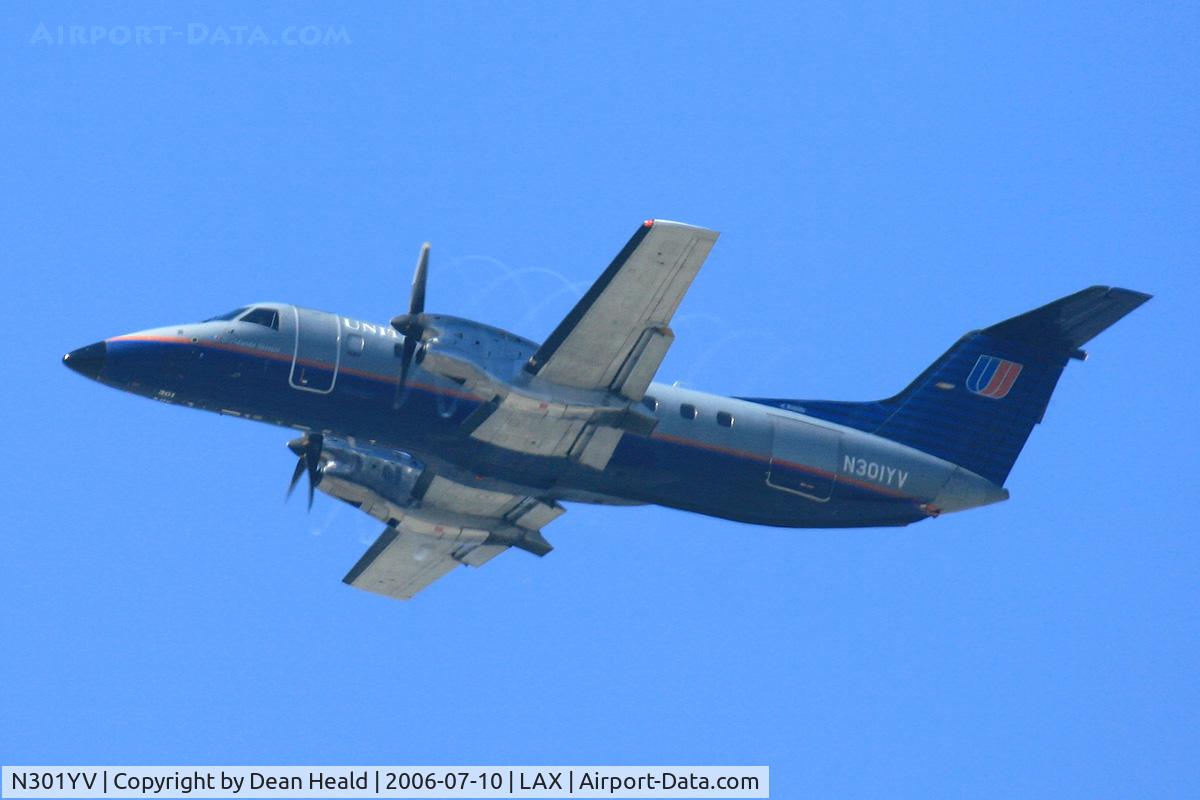 N301YV, 1995 Embraer EMB-120ER Brasilia C/N 120.301, United Express (Sky West) N301YV (FLT SKW5750) climbing out from RWY 25R enroute to McClellan Palomar (KCRQ).  Note the vortices that are visible from the propeller blade tips.  You can see several revolutions of these vortices.