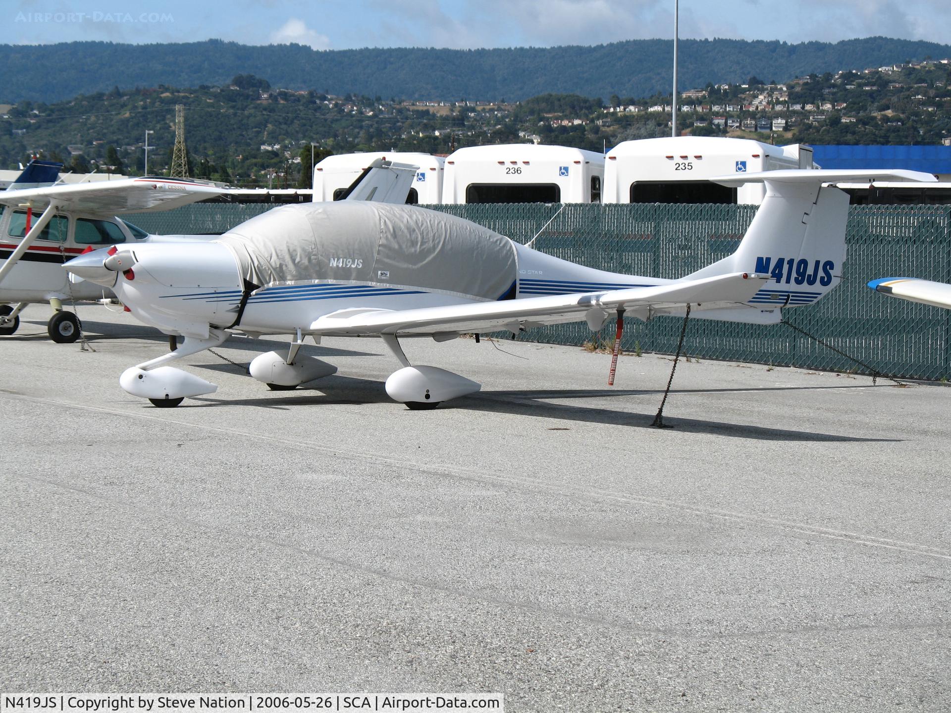 N419JS, 2004 Diamond DA-40 Diamond Star C/N 40.439, 2004 Diamond Aircraft DA-40 with cockpit cover @ San Carlos Municipal Airport, CA